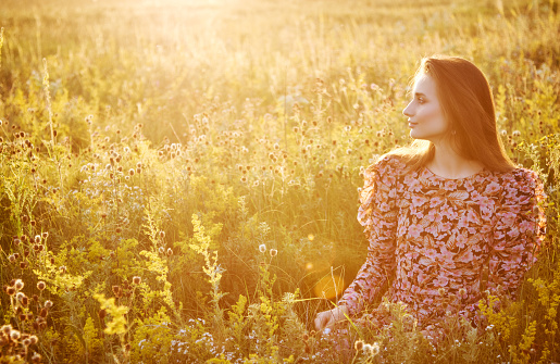 girl in the field in the sun