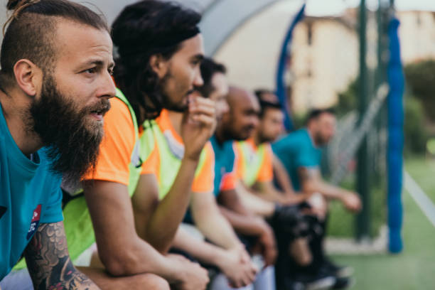 istock Football team during a match 1398943978