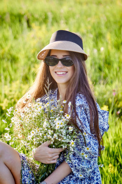 istock girl in the field 1398944037