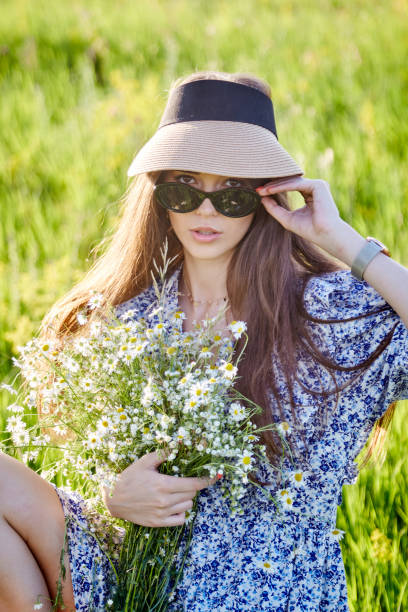 istock girl in the field 1398944045