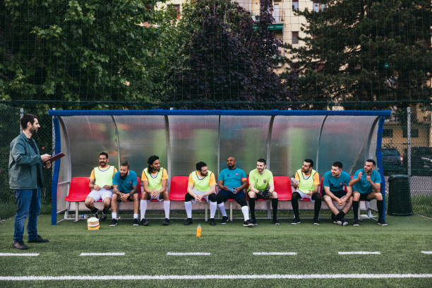 The coach and team players