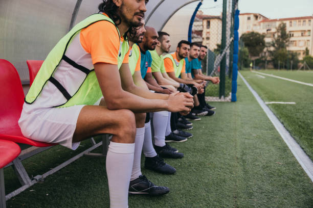 istock Football team during a match 1398945431