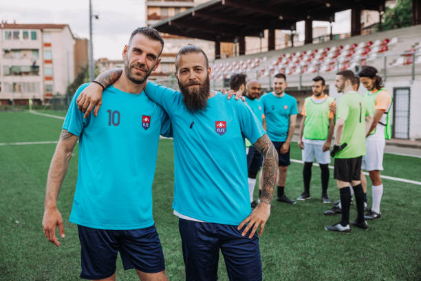 istock Football team portraits 1398945464