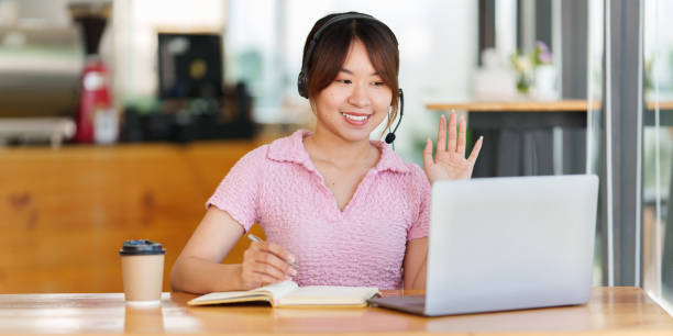 istock E-learning Online Education concept. Asian woman attentive student student video conference e-learning with teacher on laptop computer at home. 1398946159