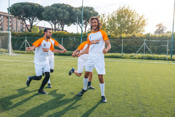 istock Soccer team celebrates a match success 1398946315