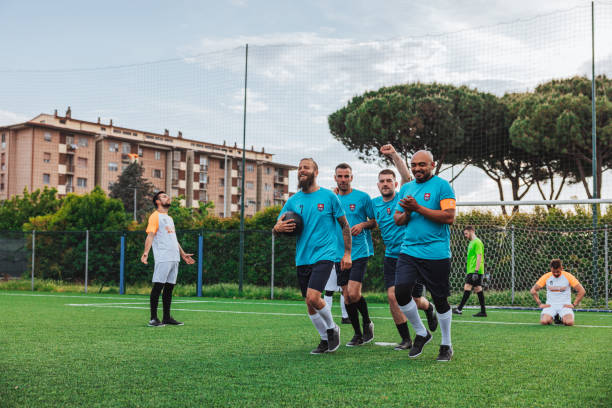 istock Soccer team celebrates a match success 1398947220