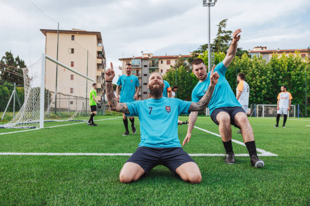 istock Soccer team celebrates a goal 1398947397
