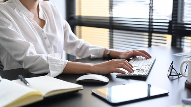istock Cropped shot accountant manager working at office with modern devices. 1398948079