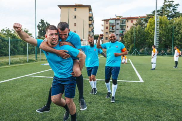 istock Soccer team celebrates a match success 1398948304