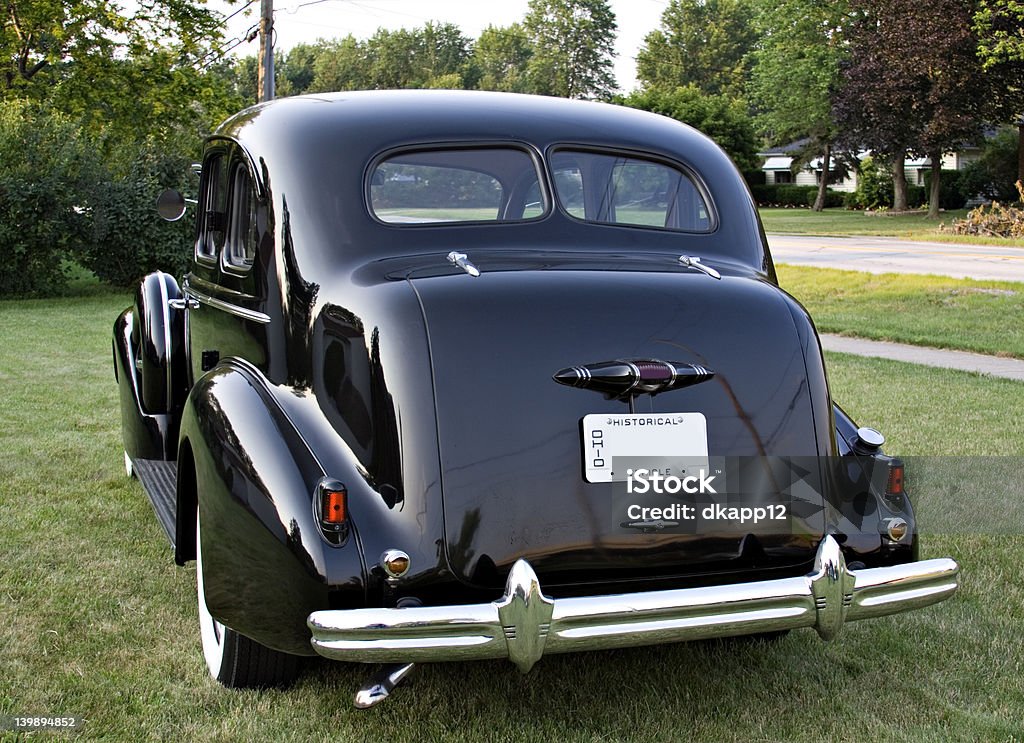 Rear Side View Vintage Buick A rear side view of a black vintage Buick - Emblems removed - 1930's? Old Stock Photo