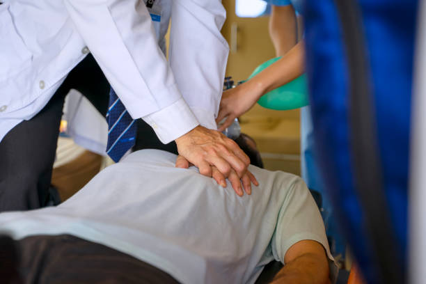 Doctor check up patient in ambulance car. Along side with assistant. Medical and health care concept.