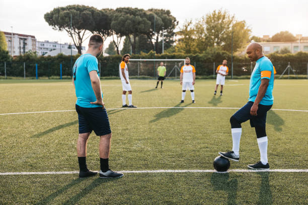 istock Soccer teams ready to start the match 1398948997