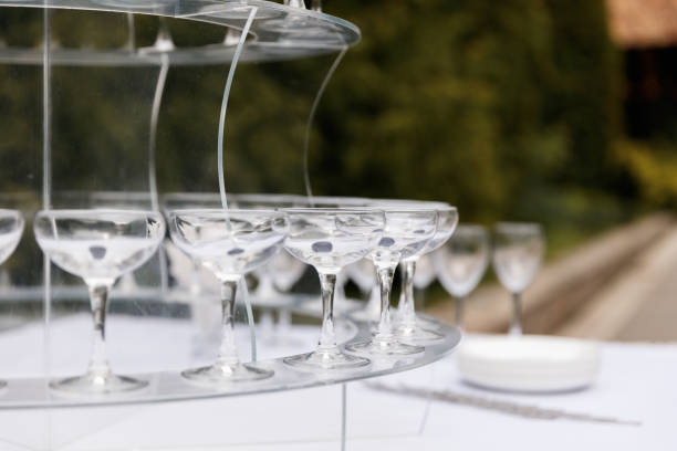 istock Empty glasses on a champagne slide, hill 1398949278