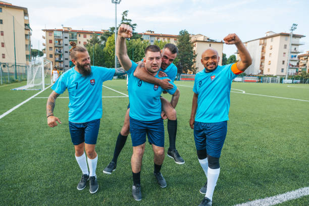istock Soccer team celebrates a goal 1398949305