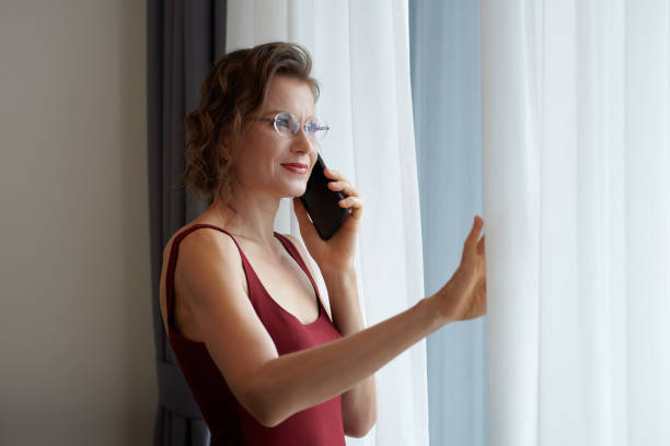 istock Elelegant Woman Making Phone Call 1398951093