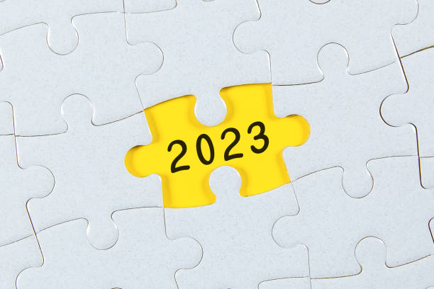 istock 2023 on puzzle background - New year Concept 1398951413