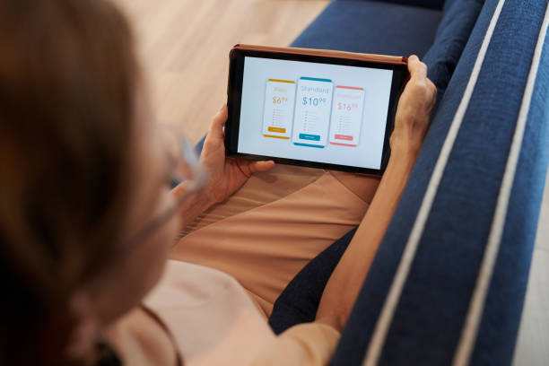 istock Woman Choosing Subscription Plan 1398952318