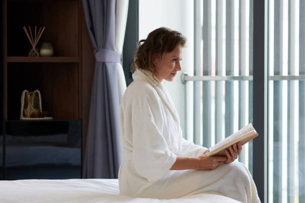 istock Woman Captivating Novel 1398952531
