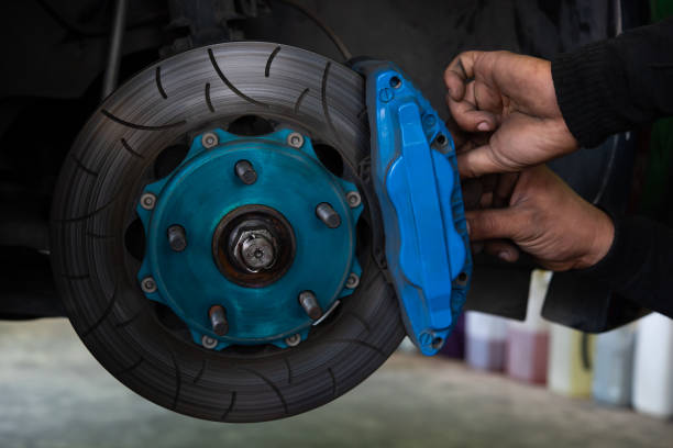 istock Checking car brake system for repair at car garage 1398953000