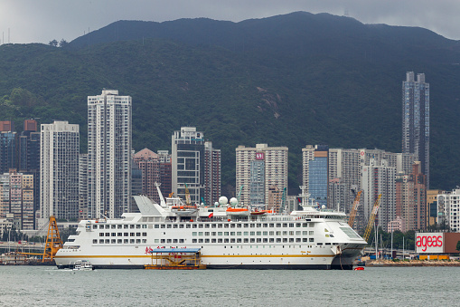 Quarry Bay, Hong Kong - June 15, 2016 : Cruise Ship Moored On Quarry Bay. Quarry Bay Is An Area Beneath Mount Parker In The Eastern District Of Hong Kong Island.