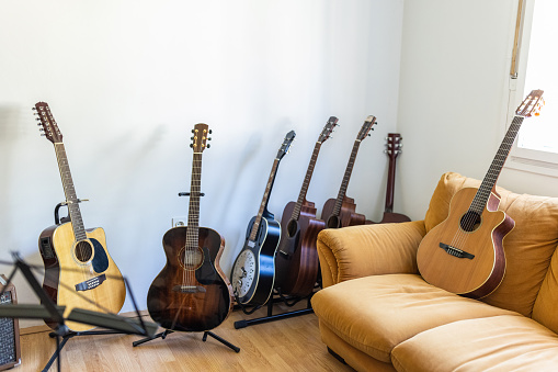 Few kinds of guitars at the music school