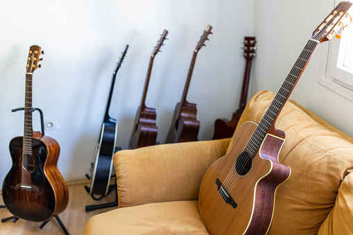 Few kinds of guitars at the music school