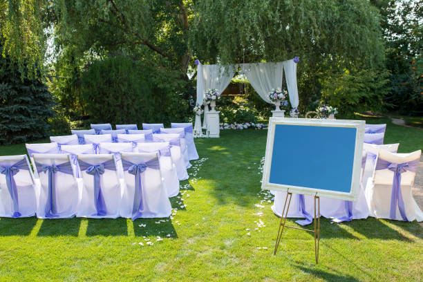 istock Prepared place for the wedding ceremony, with chairs and an arch 1398954566