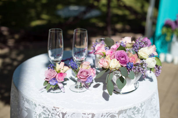 istock composition with fresh flowers with wedding glasses for the ceremony 1398955038