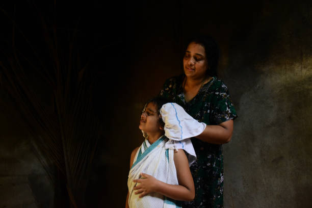 istock mother drying daughters hair 1398955638