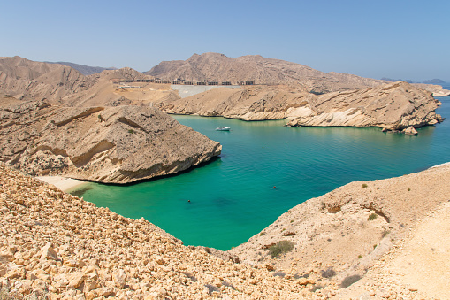 Muscat, Oman - along the highway between Muscat and Sur, Oman displays dozens of wonderful beaches, both sandy and rocky, with dunes or cliffs, and amazing green waters