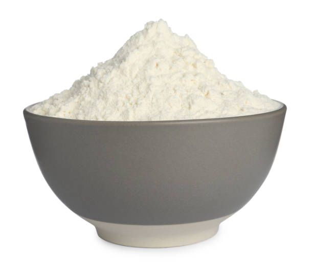 istock Ceramic bowl with flour isolated on white. Cooking utensil 1398957158