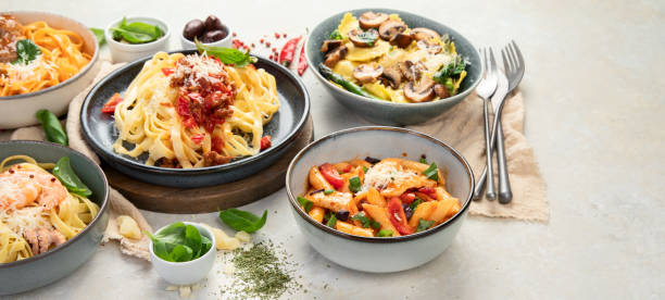 istock Italian pasta assortment on light background. 1398959609