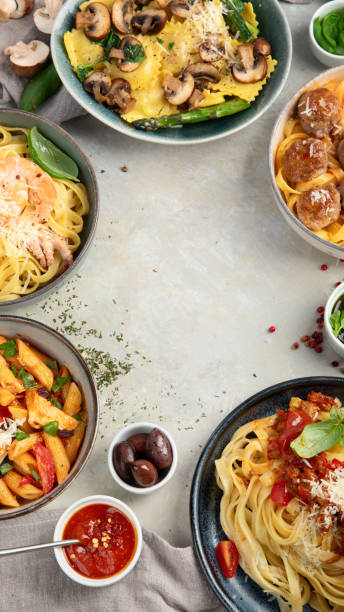 istock Italian pasta assortment on light background. 1398959980