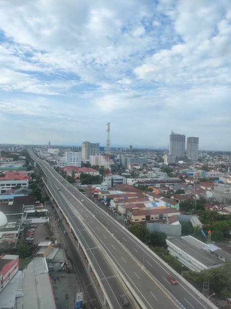 istock Toll road atmosphere in makassar city 1398960437