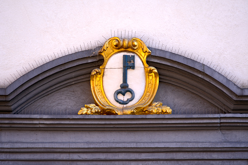 Emblem and golden crown at old town hall Altes Rathaus Potsdam, baroque architecture from 1753-1755