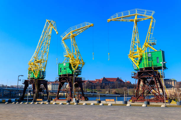 Old cranes on city boulevard in Szczecin, Poland stock photo