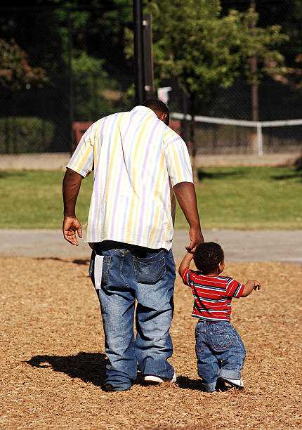istock Father and  Son in the Park 139896576