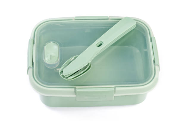 istock Plastic food storage container and cutlery set on white background 1398965812