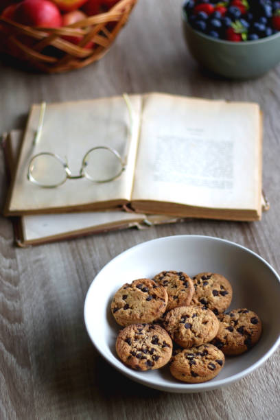 istock Fruit, Cookies, Books and Glasses 1398967004