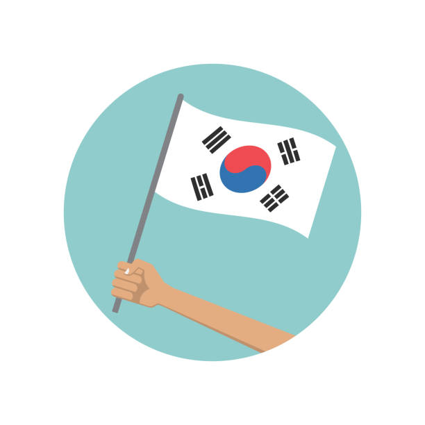 istock South Korea waving flag circle icon. Hand holding Korean flag. National symbol. Vector illustration. 1398967318