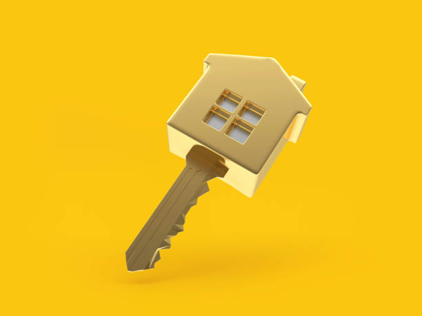 istock Golden key with a house figurine 1398967349