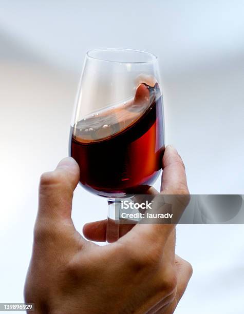 Rojo Vino Tinto De Vidrio En Un Lado Foto de stock y más banco de imágenes de Vino - Vino, Vaso, Adulto