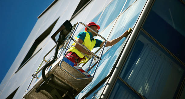istock Cleaning windows on a residential building. 1398969483