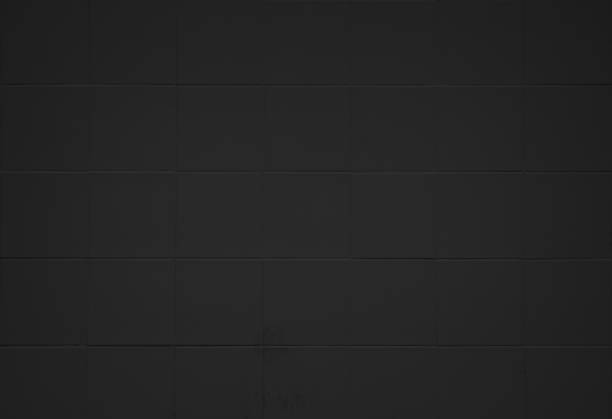 istock Black tile high resolution real photo. Brick seamless pattern and texture square floor ceramic tiles interior room background. Dark grid tiles wall texture for the bander decoration backdrop. 1398973699