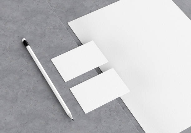 istock Base white stationery mockup template for branding identity on a gray concrete background for graphic designers presentations and portfolios. 3D rendering. 1398973709