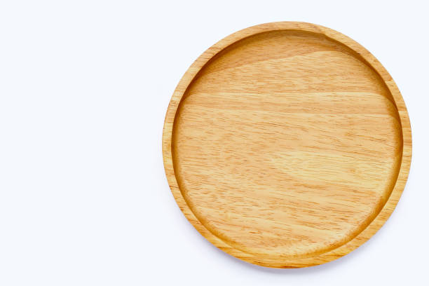 istock Wooden plate on white background. 1398974017