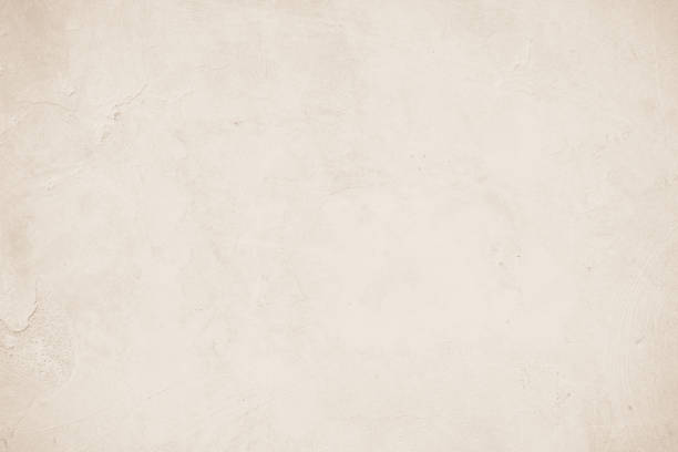 istock Old concrete wall texture background. Close up retro plain beige color cement material surface rough for show or advertise promote product content on display and brown paper design element concept. 1398974032