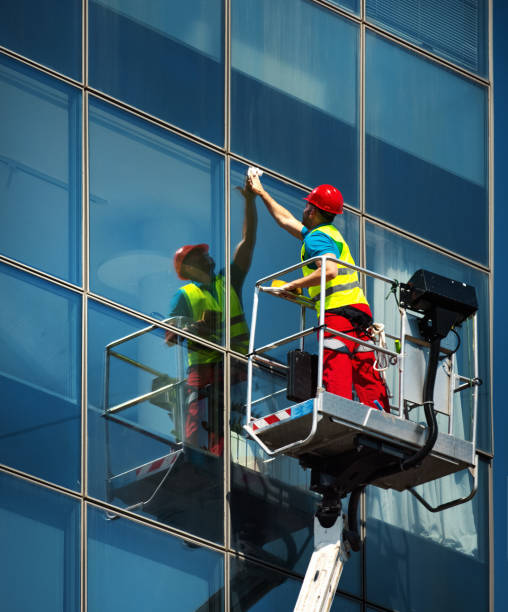 istock Cleaning windows on a residential building. 1398975075