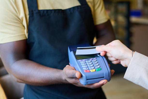 istock Customer paying for order with credit card 1398976945