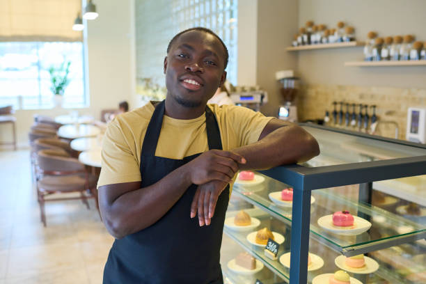 istock Owner working at his coffee shop 1398977075